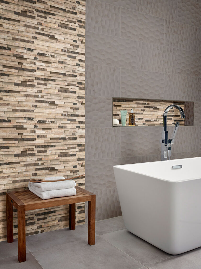 Adella Viso Gris 12×24 Satin Wall backsplash in a styled room