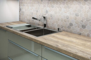Angora Polished 2″ Hexagon Mosaic styled in a finished room
