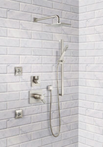 Arabescato Carrara Beveled Tile 4×12 styled in a finished room