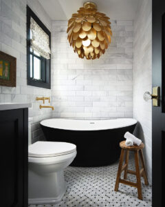 Arabescato Carrara Beveled Tile 4×12 styled in a finished room