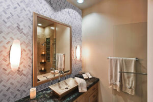 Bergamo Herringbone Polished styled in a finished room
