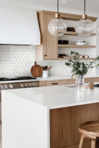 Bianco Dolomite Pinwheel Polished Marble Mosaic styled in a finished room
