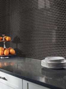 Black Glossy Penny Round Mosaic styled in a finished room