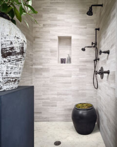 Pietra Calacatta 2” Hexagon Mosaic styled in a finished room
