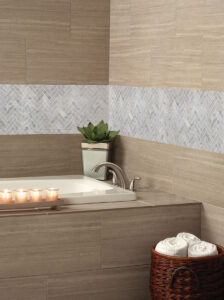 Carrara White 1×3 Herringbone Polished styled in a finished room