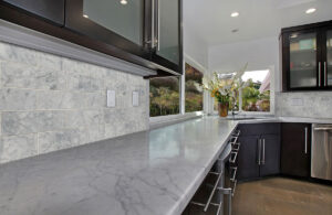 Carrara White Marble Subway Tile 4×12 styled in a finished room