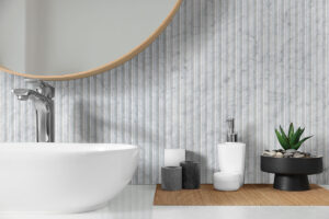 Carrara White Valentino Fluto 12×24 Honed styled in a finished room