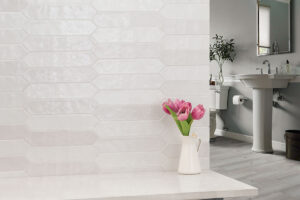 Renzo Dove 2.5×13 Pickett Mosaic styled in a finished room