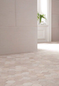 Honey Comb Multi Finish 2″ Hexagon Mosaic styled in a finished room