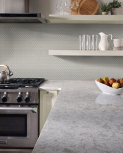 Gray Glossy Herringbone Mosaic styled in a finished room