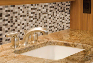Ibiza Blend 1″ x 1″ Glass & Stone Blend Mosaic Sheet styled in a finished room