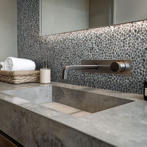 Noir Ash Mini Pebble styled in a finished room