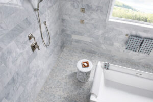 Sliced Carrara White Pebble styled in a finished room