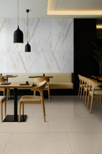 Marmiro Gold 16×48 Large Format styled in a finished room