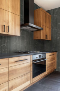 Marmiro Noir 16×48 Large Format styled in a finished room