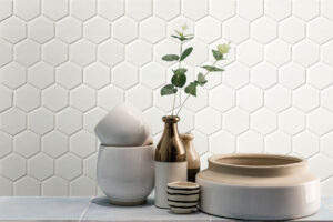 White Matte 2” Hexagon Mosaic styled in a finished room